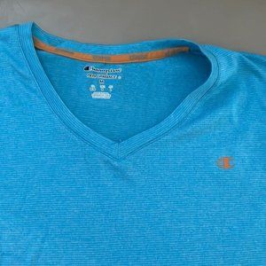 SIZE medium woman's v-neck ocean blue Vapor  performance top by Champion –
